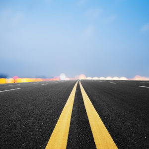 Synthetic material, asphalt road and sky